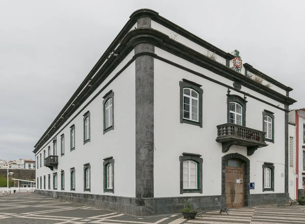 Historic customs house with dark stone trim in Angra do Heroísmo