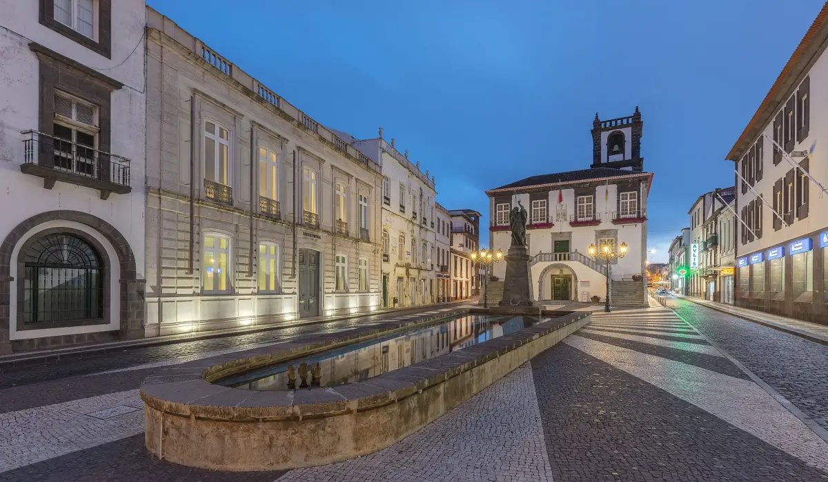 Town hall and paved square in the centre of Ponta Delgada at dusk