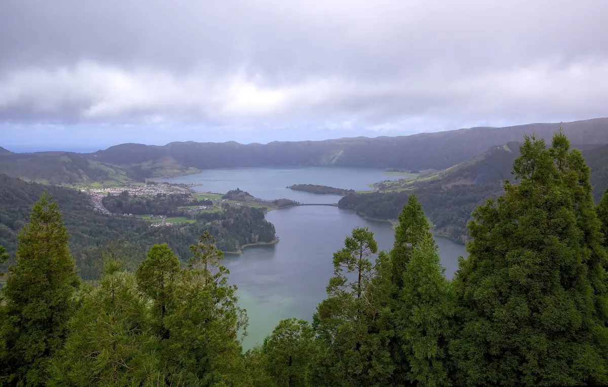 Blue and green lakes of Sete Cidades beneath a soft grey sky